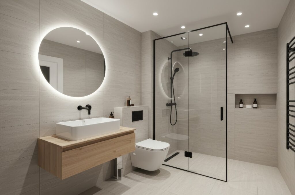 Ein minimalistisches Badezimmer mit Dusche, Toilette und Waschbecken.